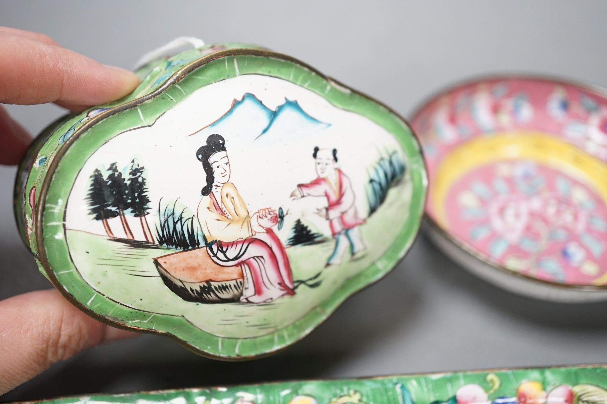 A group of Chinese Canton enamel dishes and two boxes and covers, 24cm